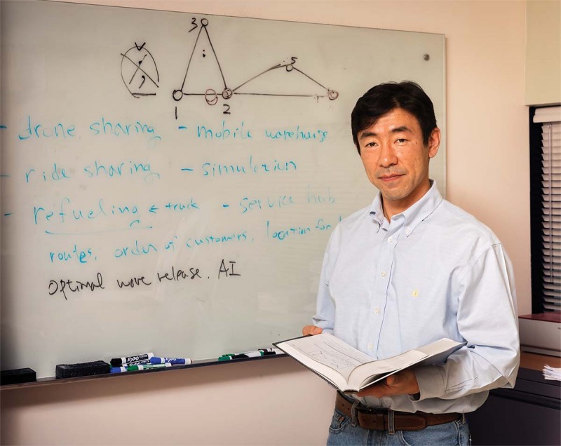 Assistant Professor Sung Hoon Chung calculates optimum routes for autonomous vehicles.