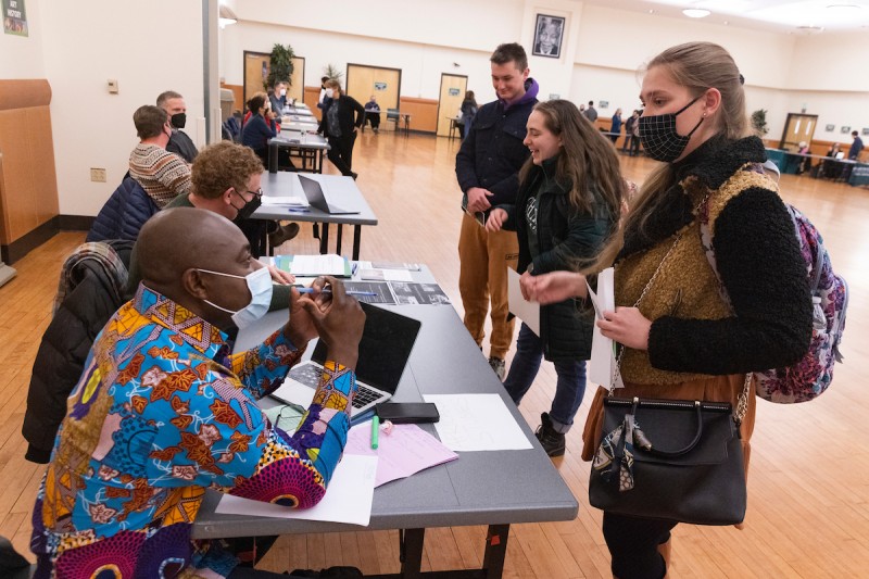 Meet-the-faculty fair was one of the first events that kicked off the first-ever Harpur Week, which ran from March 28 through April 1. Pictured here, first year student Maggie Reppa, who is considering a major in linguistics, speaks with Samuel Elikem Kwame Nyamuame
Visiting Assistant Professor of Africana Studies.