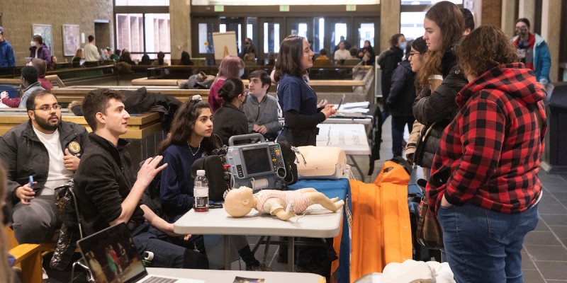 Admitted students talk with representatives of Harpur's Ferry Student Volunteer Ambulance Service during the Admitted Student Open House, April 3, 2022.