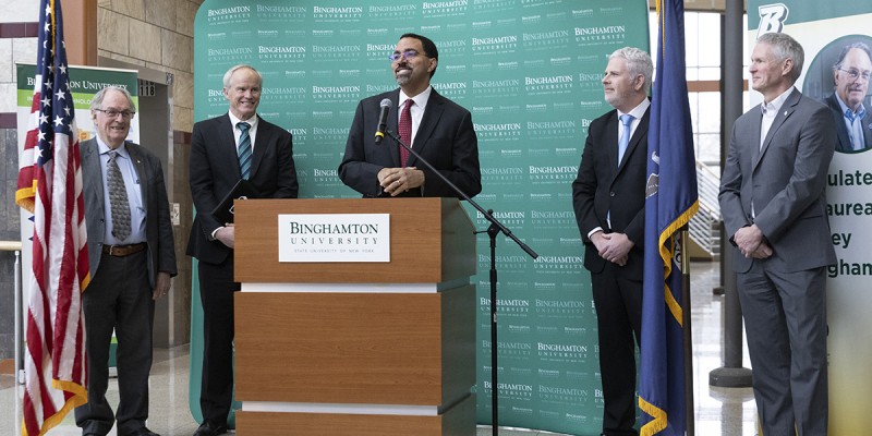 New SUNY Chancellor John B. King Jr., center, speaks to the media Jan. 17, at the Innovative Technologies Complex, following a whirlwind tour of Binghamton University's campuses. He's flanked by, from left, Distinguished Professor and Nobel Laureate M. Stanley Whittingham, President Harvey Stenger, Broome County Executive Jason Garnar and Associate Vice President for Innovation and Economic Development Per Stromhaug.