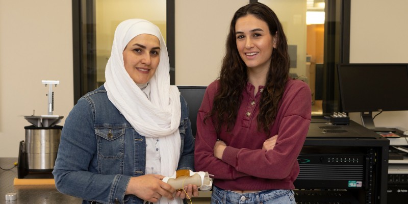 Sara Aghazadeh, MS '23, and Jessica Abreu '23, are among the latest women graduates of the Thomas J. Watson College of Engineering and Applied Science's mechanical engineering program. They are photographed at Associate Professor Shahrzad 