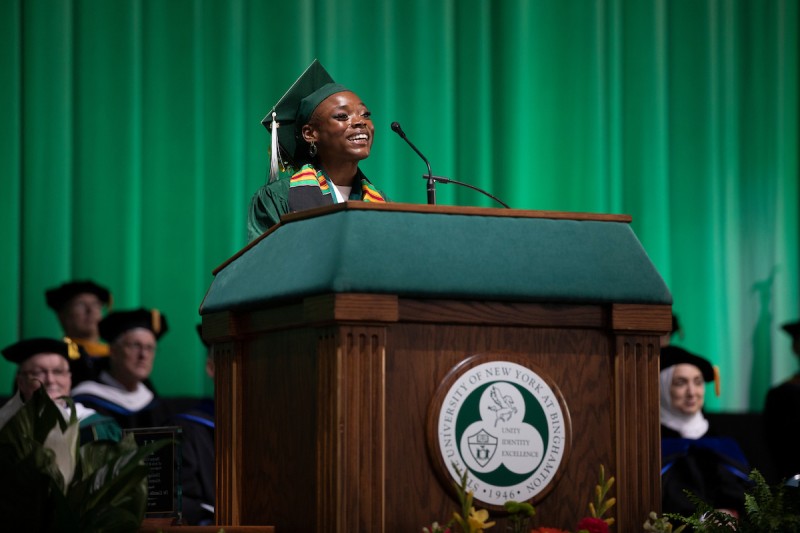 Student speaker Blessin McFarlane gives her advice to peers at the first Harpur College Commencement ceremony on May 13, 2023.