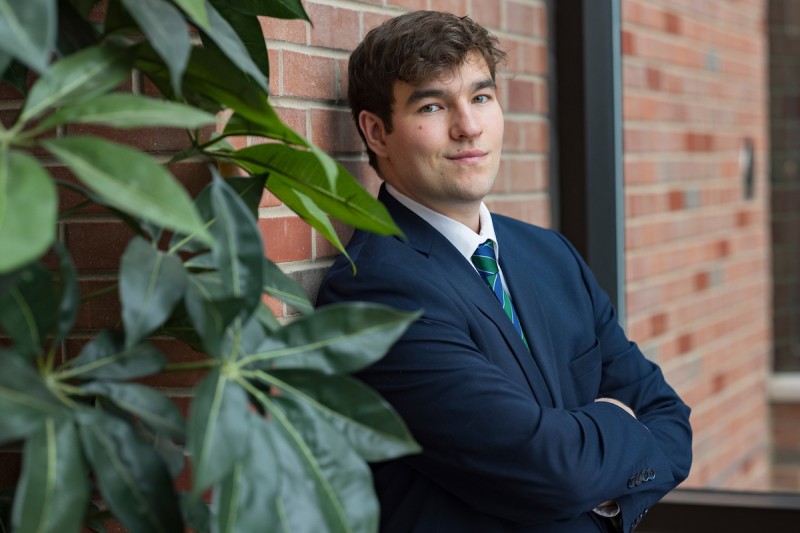 Graduate student and Zero Hour Binghamton co-founder Elijah Conlin is committed to environmental justice in the local community and beyond. Photographed in the University Union.