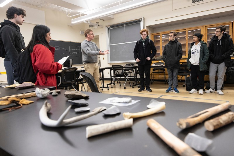 Research Assistant Professor and Director of Undergraduate Studies Sebastien Lacombe leads a discussion in the Archaeology Teaching Lab for World Anthropology Day.
