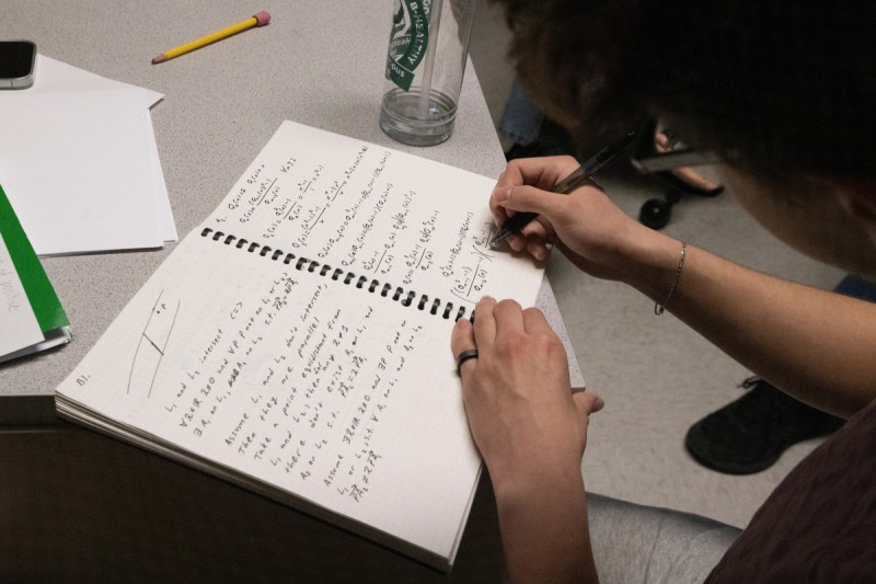 Detail of student Nikita Safronov's notes during a math problem-solving session on March 26.