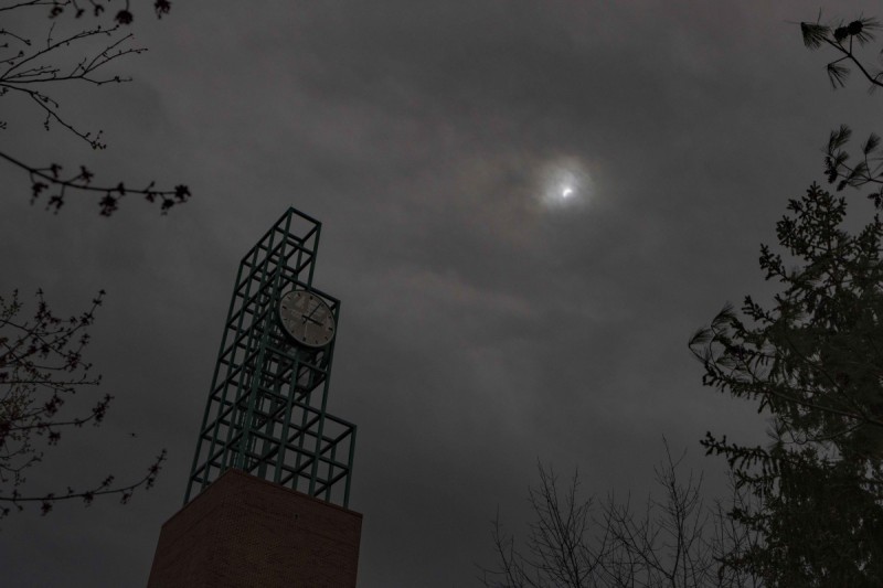 The last glimpse of the solar eclipse, before it's completely swallowed by clouds on April 9.