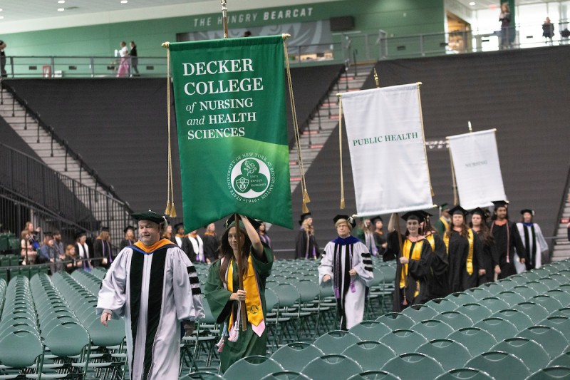 Baccalaureate and master's students graduating from Decker's nursing and public health programs participated in the college's Commencement ceremony, while nursing and occupational therapy students graduating with doctoral degrees attended the University-wide hooding ceremony.