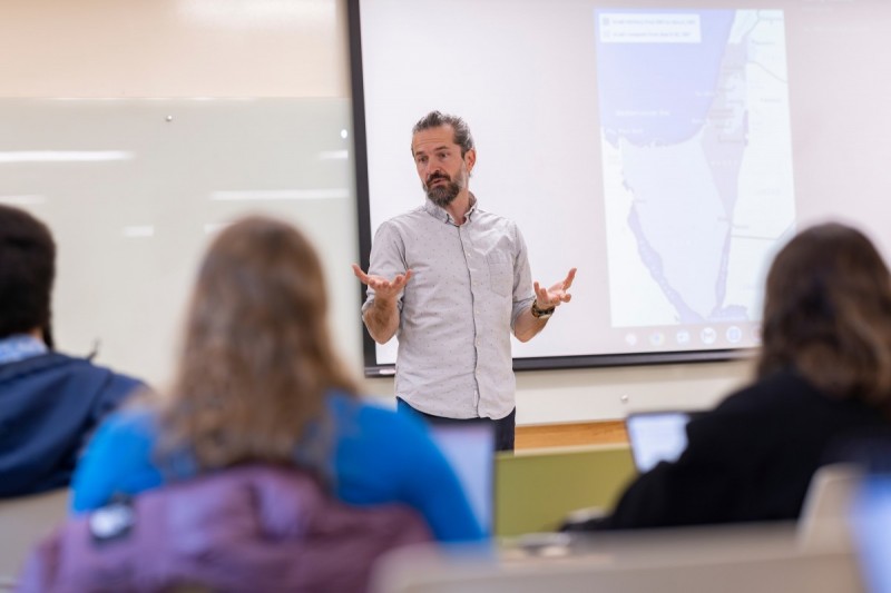 Shay Rabineau, Chair of Judaic Studies and Associate Professor of Israel Studies, has worked to create a safe, welcoming space for students. He is pictured here teaching a class on Monday, March 24, 2025.