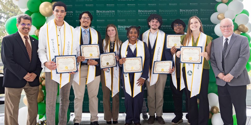 The Thomas J. Watson College of Engineering and Applied Science recently honored members of the first cohort of the Watson College Scholars Program who graduate in May 2025. From left are Watson Dean Atul Kelkar, Jonel Poueriet-Santana, Ray Inoa, Danielle Johns, Sandrique Knight, Christian Martinez, Bryan Perez, Katherine Peters and Provost Donald Hall. (Not pictured: Joey Zhang.)