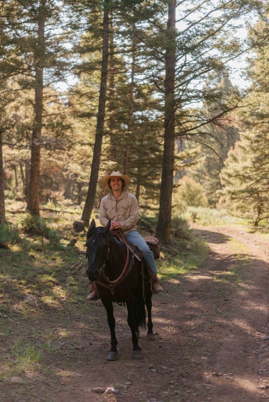 Ian Skinner on a horse at Alderspring Ranch in Idaho.