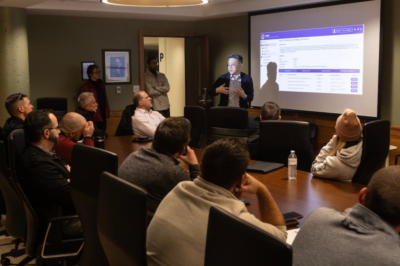 Professor Sangwon Yoon talks with local police about the Police Investigation Management System during a meeting at Binghamton University in November 2025.