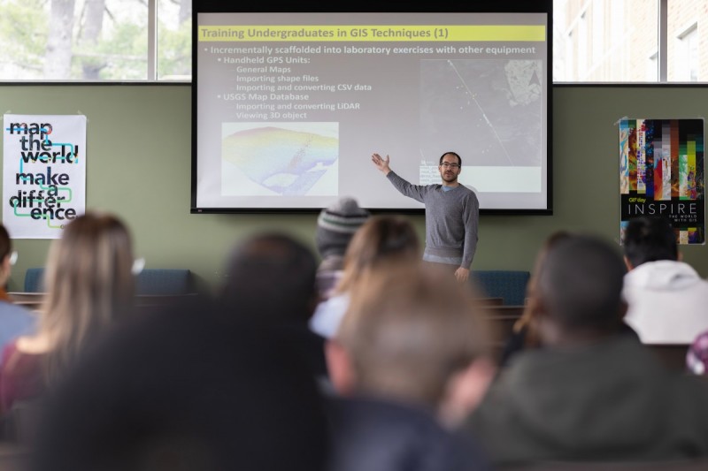 Research Assistant Professor Joe Panzik discusses how the First-year Research Immersion (FRI) program’s Environmental Visualization stream introduces students to a variety of GIS techniques during a lightning talk on GIS Day on Nov. 21, 2015.
