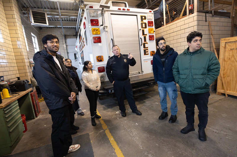 Chief Patrick Garey shows Watson students on the PIMS development team around the Endicott police station last fall. Students from left are Pranshu Desai, Sarah Escotto, Hemi Patel, Shreya Agarwal, Mohammed-Khalil Ghali, and Abdelrahman Farrag.