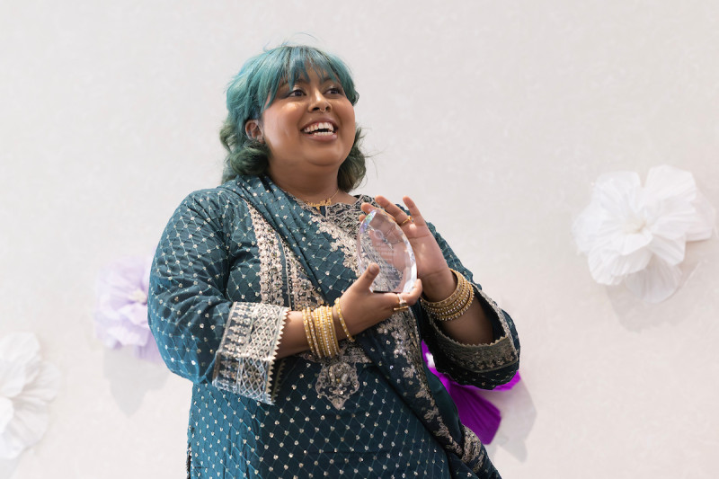 Mansha Rahman received the OUTStanding Award. and delivered the graduate student address.