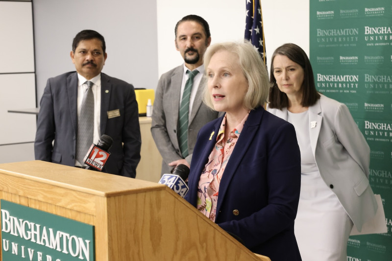 Sen. Kirsten Gillibrand announces a new bill, the Professional Student Degree Act, with (back left to right) School of Pharmacy and Pharmaceutical Sciences Dean Kanneboyina Nagaraju, Decker College of Nursing and Health Sciences Dean Mario Ortiz, and Binghamton University President Anne D'Alleva.