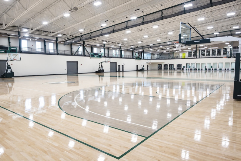 Binghamton University's East Gym 75,000-square-foot expansion includes three hardwood courts for basketball and volleyball.