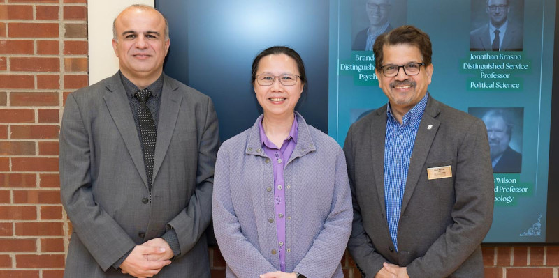 Sarah Lam, a faculty member in the School of Systems Science and Industrial Engineering, was elevated to SUNY distinguished teaching professor earlier this year. She was honored at a luncheon for all new Binghamton University distinguished professors in October. With her at the luncheon are Distinguished Professor and SSIE Director Mohammad Khasawneh, left, and Watson College Dean Atul Kelkar.