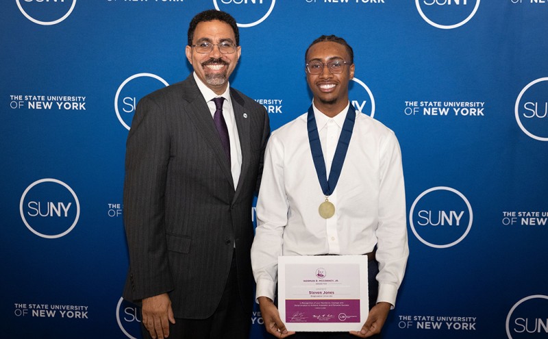 School of Management student Steven Jones received the Norman R. McConney Jr. Award for Student Excellence from SUNY Chancellor John King at a ceremony March 10, 2026.