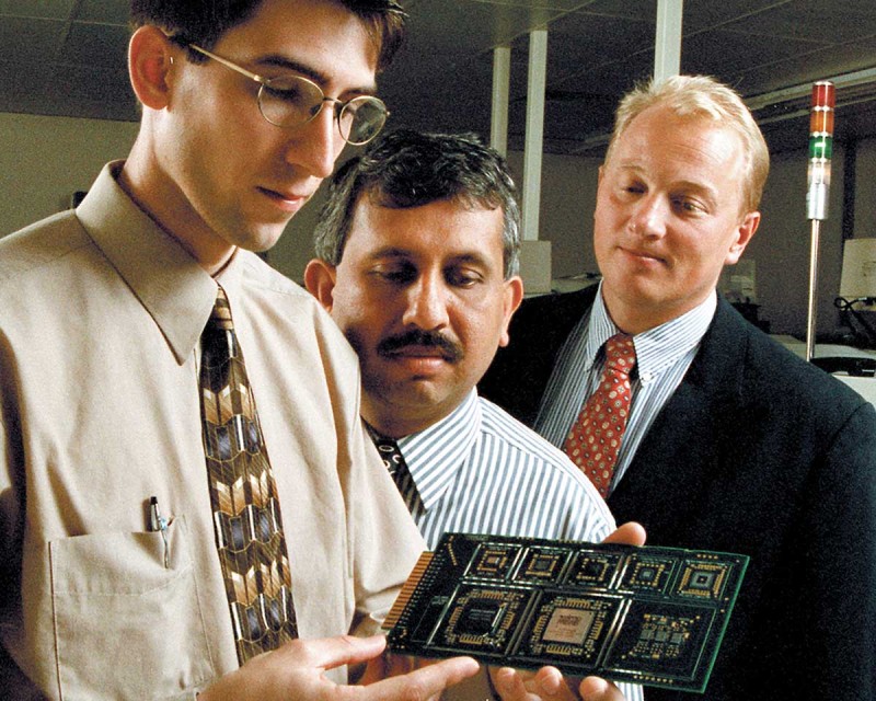 From left, Jeffrey Schake '96, MS '98, then-Professor Krishnaswami 