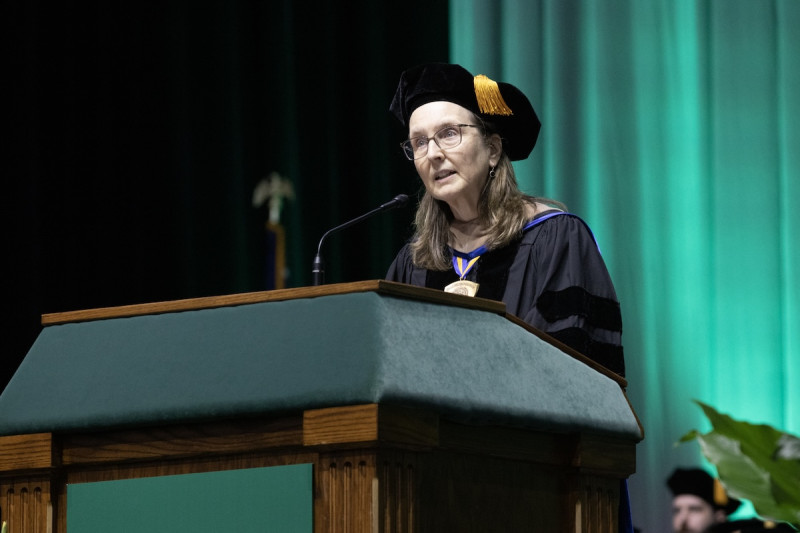 School of Management Dean Shelley Dionne speaks during the 2026 Commencement ceremony.