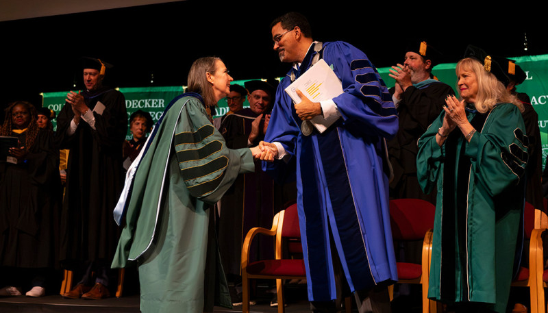 Binghamton University President Anne D'Alleva shakes hands with State University of New York Chancellor John B. King Jr. during her inauguration ceremony Oct. 2, 2026.