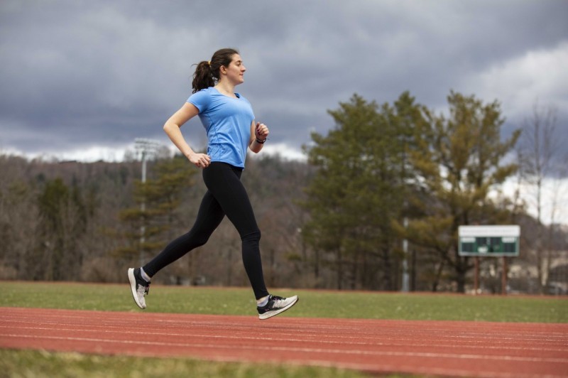 Binghamton University sophomore Annalise Jarski runs on the campus track.