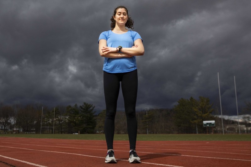 Binghamton University sophomore Annalise Jarski stands on the campus track.