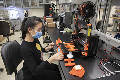 Doctoral student Huimin Zhou is working with Watson faculty who are producing a variety of prototypes for ventilator adapters that would allow use of one ventilator by multiple patients.