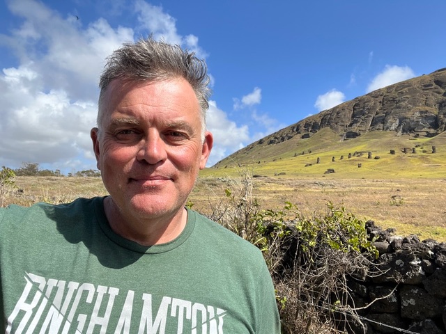 Binghamton University archaeologist Carl Lipo in Rapa Nui (Easter Island), known for its largely treeless landscape.