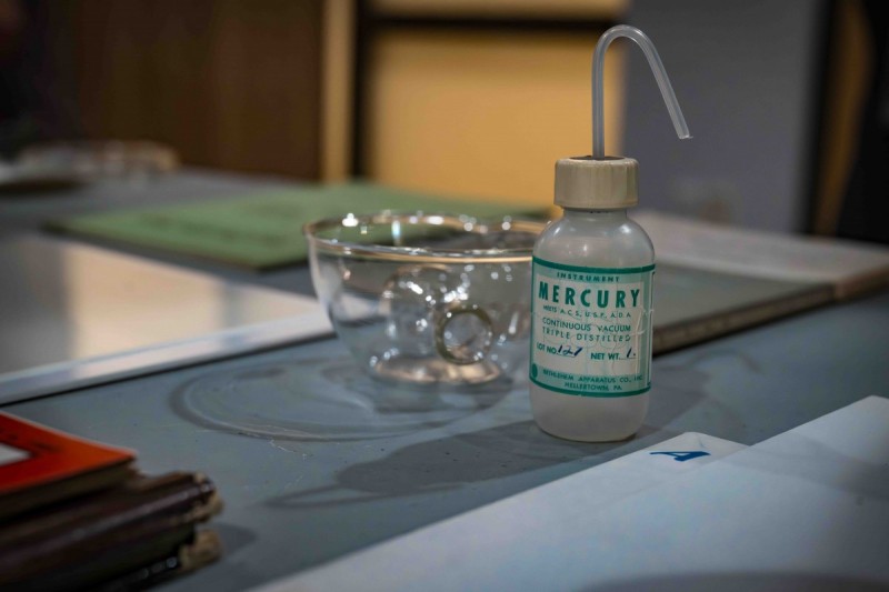 A bottle of mercury and a piece of laboratory equipment discovered in the Science 1 time capsule.