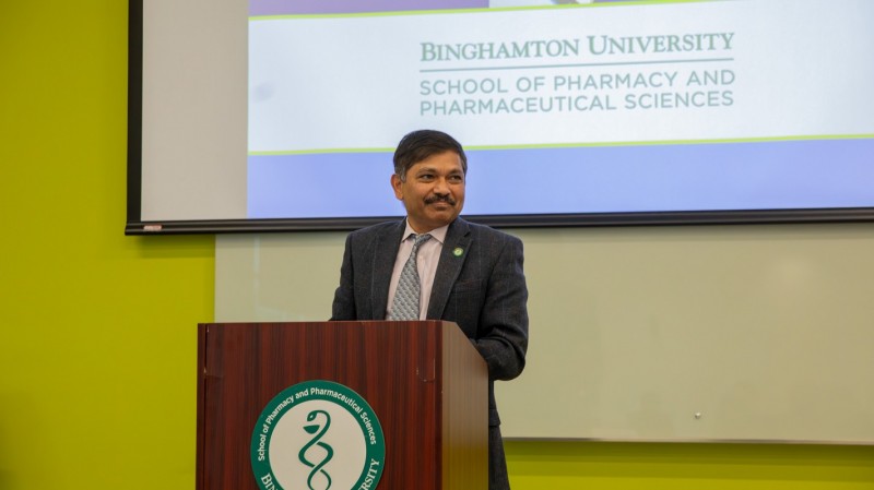 Dean Nagaraju addresses the learners during his speech at the graduation ceremony, expressing how proud he is of this new group of graduates.