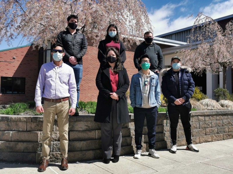 Binghamton University Assistant Professor of Physics Ana Laura Elías (center front) and members of her lab.