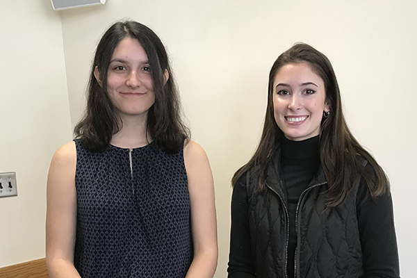 Eliza Klingler, left, and Jordan Thesier, both sophomores, presented to the Binghamton University Council about their research experiences as members of the First-year Research Immersion program and the Source Project, respectively.