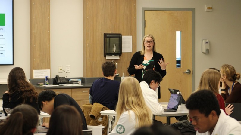 Clinical Associate Professor of Pharmacy Practice Emily Leppien explains to the students about the purpose of the training and how the activity will go.