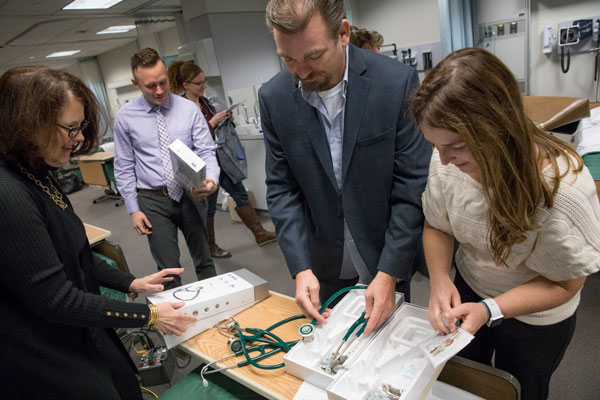 The Advanced Nursing Education Workforce (ANEW) Program funds FNP students like Daniel Babcock (in blue jacket) at Binghamton University to practice their clinical training in rural settings. The Decker School of Nursing (DSON) was awarded a $1.2 million grant from this program in 2017.