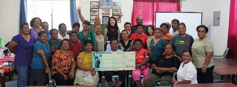 left: Amy Hyatt provides U.S. government funds to train Palau’s school cooks to prepare healthy, locally sourced school lunches.