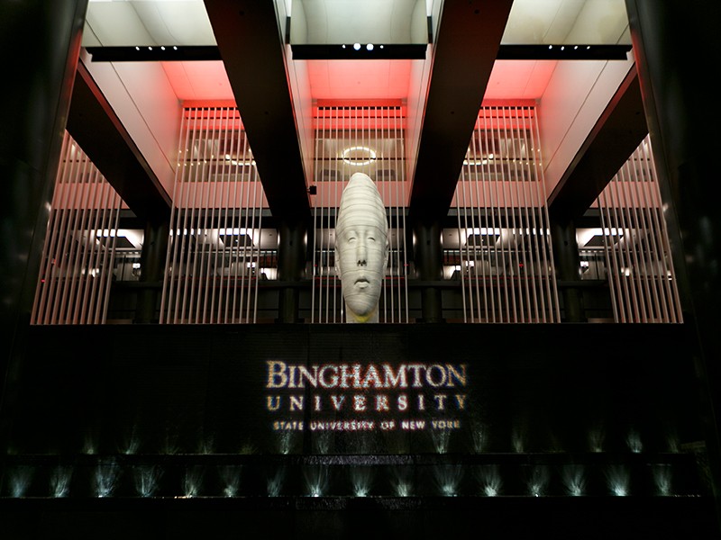 Binghamton University logo displayed prominently on a fountain in the lobby of the historic Grand Hyatt New York.