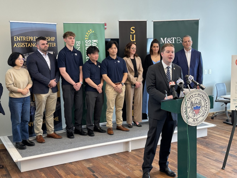 Jared Kraham, the mayor of Binghamton, speaks to the media about The Paddle House.