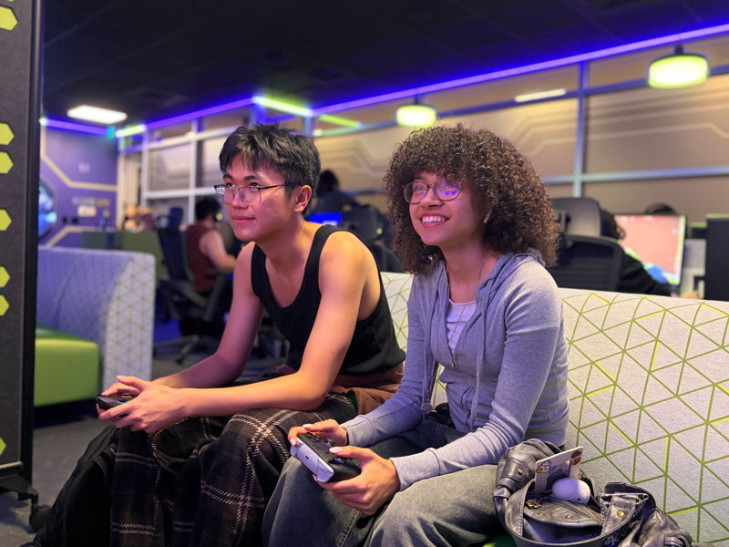 Students play Nintendo Switch 2 at Launch Point gaming lounge.