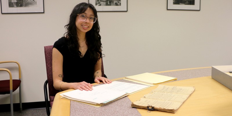 Maripaz Burbano '24 works with Bartle Library's Special Collections to document an oral history of the Educational 
Opportunity Program.
