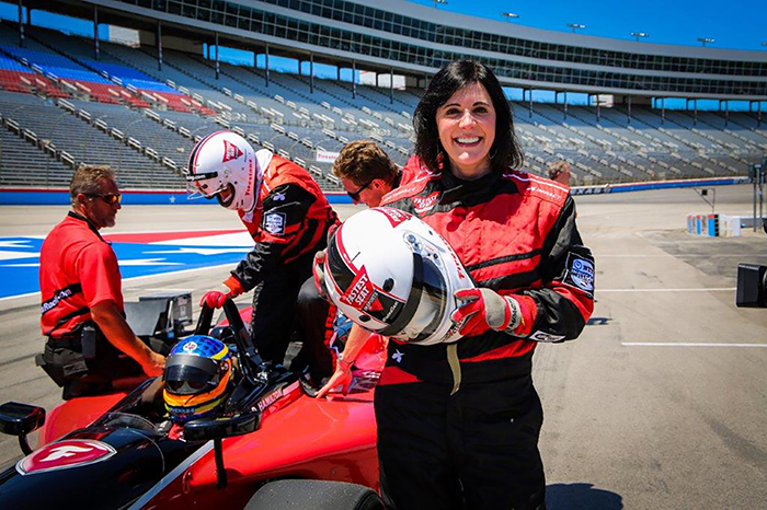 Lisa Materazzo, seen here close to the action at the Texas Motor Speedway, is Toyota Motor North America's group vice president of Toyota division marketing.