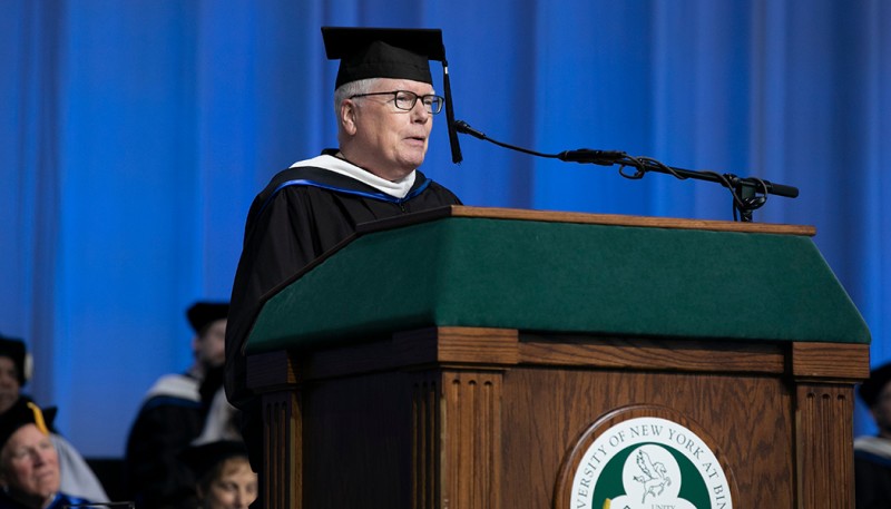Michael Timmeny '73 received the Alumni Association Award and addressed graduates at the Harpur 2 ceremony.