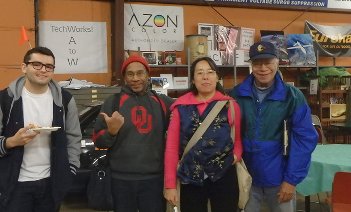 Computer science student John Null (left) with three participants of the game creation class at TechWorks!