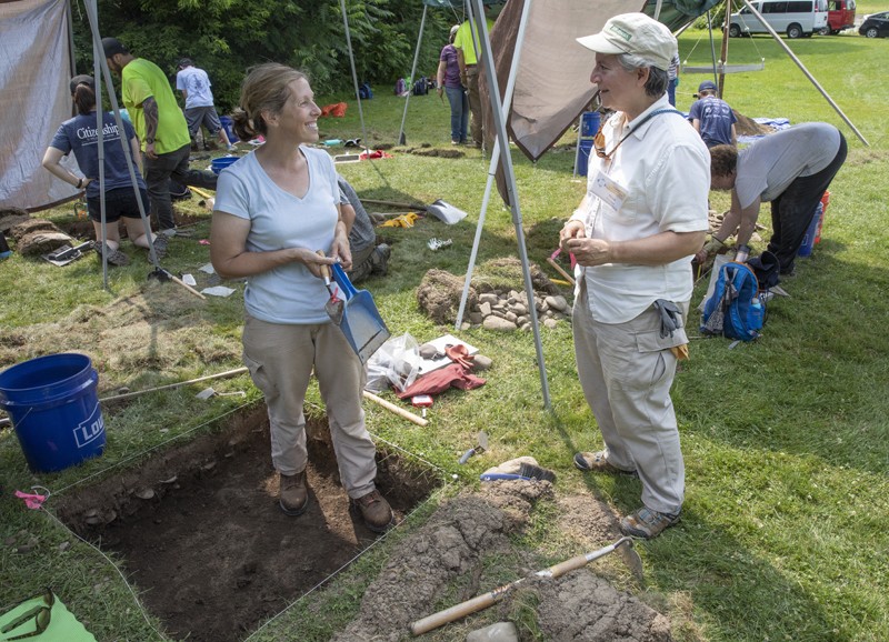 PAF Director Laurie Miroff, left, talks with her former director Nina Versaggi at a site in Whitney Point, N.Y.
