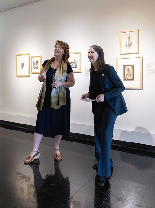 President Anne D'Alleva, an art historian, visits the University Art Museum and its director, Diane Butler.