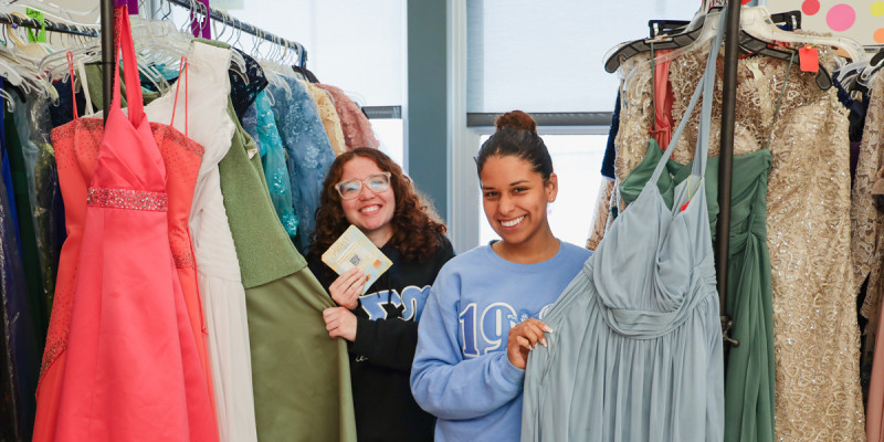 Project Prom coordinators Kaylin Camacho and Mayerli Gordillo of the Eminent Saqqara Chapter of Mu Sigma Upsilon Sorority, Inc. made donated dresses available for free for students at Johnson City High School.