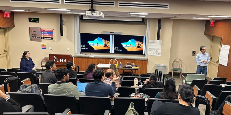 Binghamton University Associate Professor Sumantra Sarkar (far right) from the School of Management and Assistant Professor Melissa Zeynep Ertem (far left) from the School of Systems Science and Industrial Engineering lead a workshop with physicians at United Health Services in Binghamton to brainstorm ideas for data-based research on issues affecting mental health.