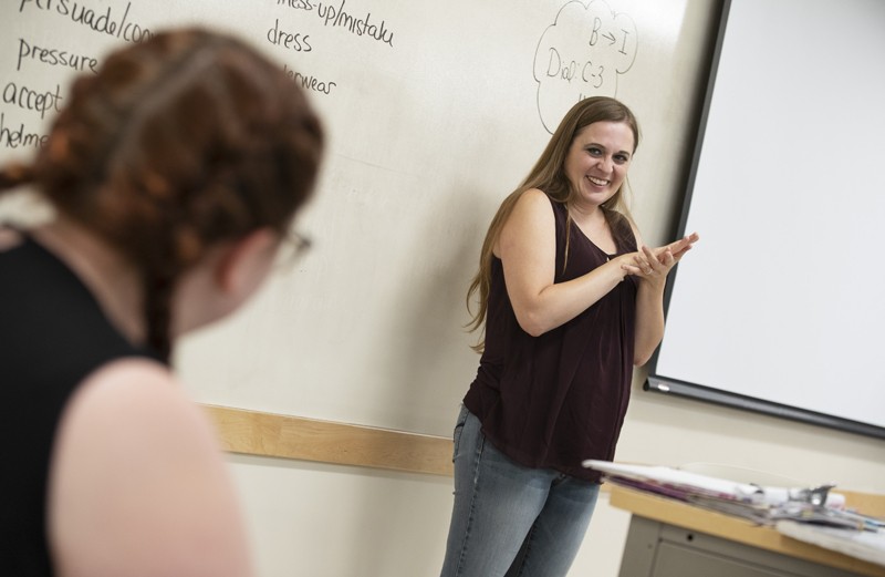 Aimee Dixon leads a Level 2 American Sign Language class during the summer.