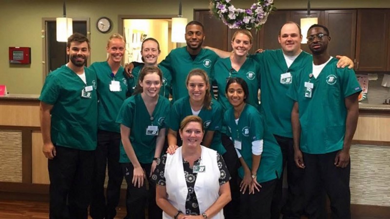 Gabrael Sindoni (second from the right) with his first clinical nursing group and Clinical Assistant Professor Alma Rood (front center).