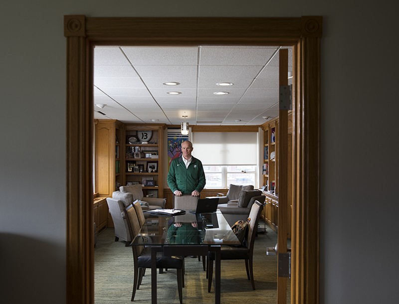 President Harvey Stenger works alone in his Couper Administration Building office in April.